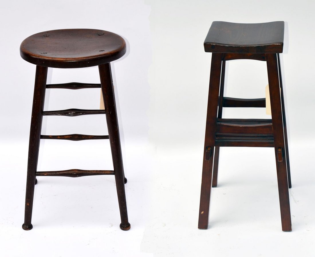 Two Wood Stools: Comprises a black walnut stool with a circular seat, through tenons and turned stretchers. Accompanied by an Asian style stool with straight legs. Both worn, but structurally sound. Taller: 30" H.