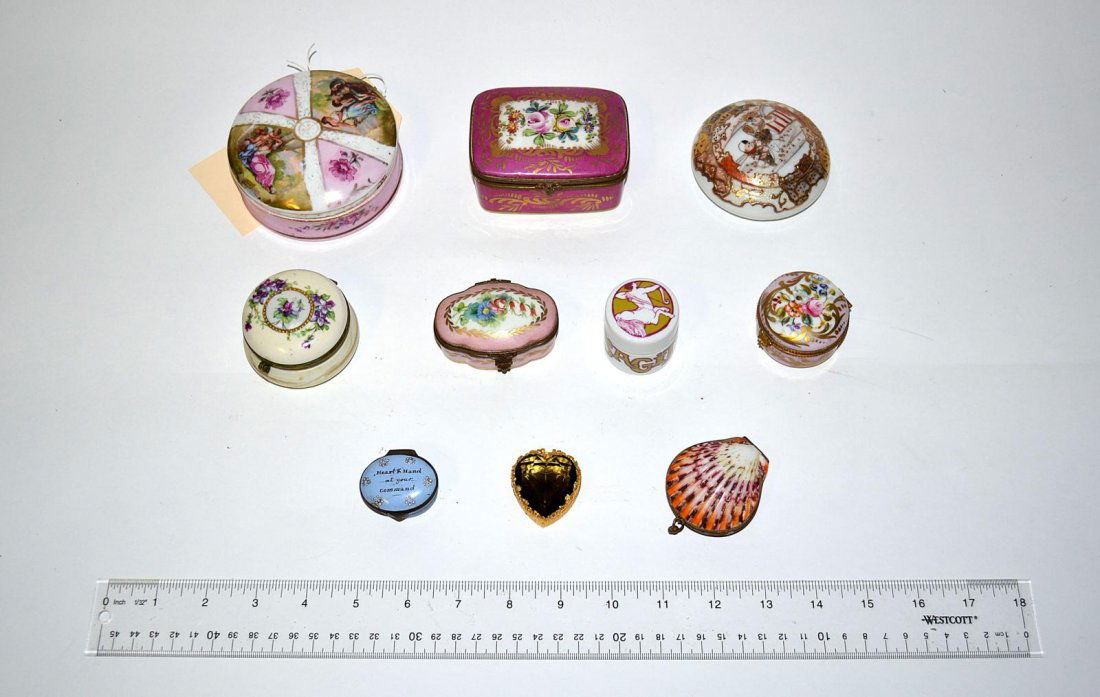 Assorted Battersea Boxes and Others [10 Items]: Comprises porcelain, gilt metal, and shell boxes. Includes vintage and antique examples with floral and pictorial decor. From 1 3/8" W to 3 7/8" Dia. As a whole, in good condition.