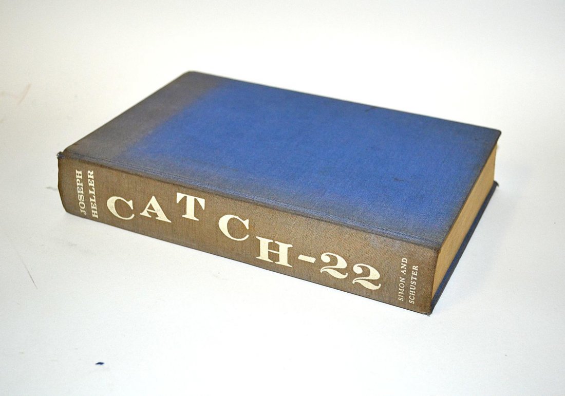1st Edition: "Catch-22" by Joseph Heller: Simon and Schuster, New York, 1961. 443 page. Light age toning, spine loose, and uneven fading to blue linen boards. No dust jacket. Fair to good condition. From the Estate of Arthur Laurents.