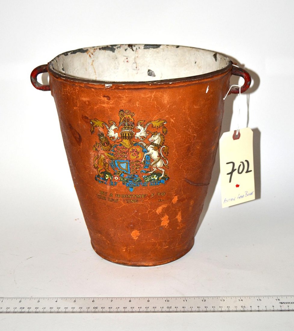 "By Appointment to the Latin King" Antique Bucket: A lead container with handles having a leather surround and coat of arms of a king. From the Estate of Arthur Laurents.