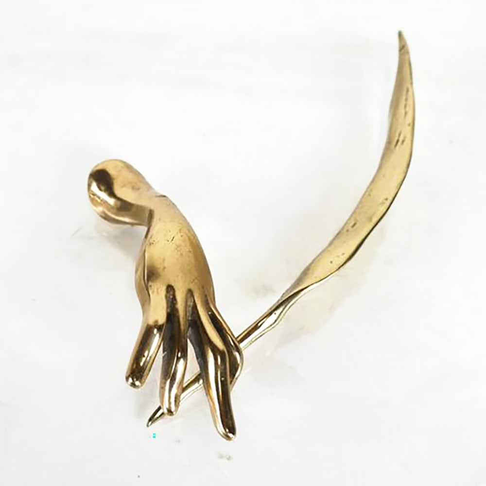 Yves LOHE: Bronze Sculpture - Hand & Quill: Gilt bronze sculpture of hand holding a feather quill pen, signed. [10 x 6 inches]. In good condition.
