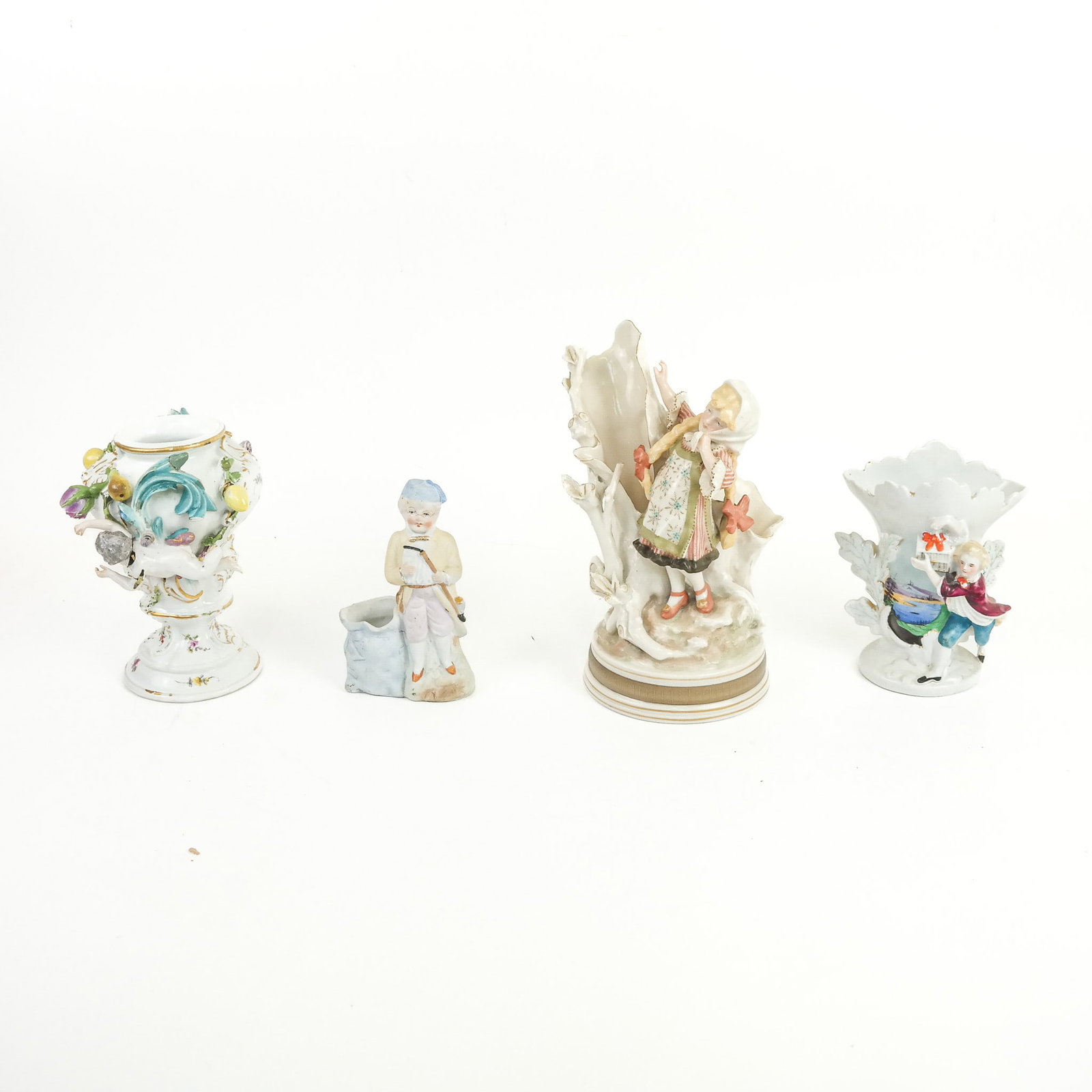 Assembled Group of Painted Porcelain Vases: Assembled group of painted porcelain figural vases, 20th century, including an encrusted Meissen vase with putti, some marked. [Tallest: 8 1/2" H x 6 1/2" Diam.]. Breaks, losses, residue, wear and mar