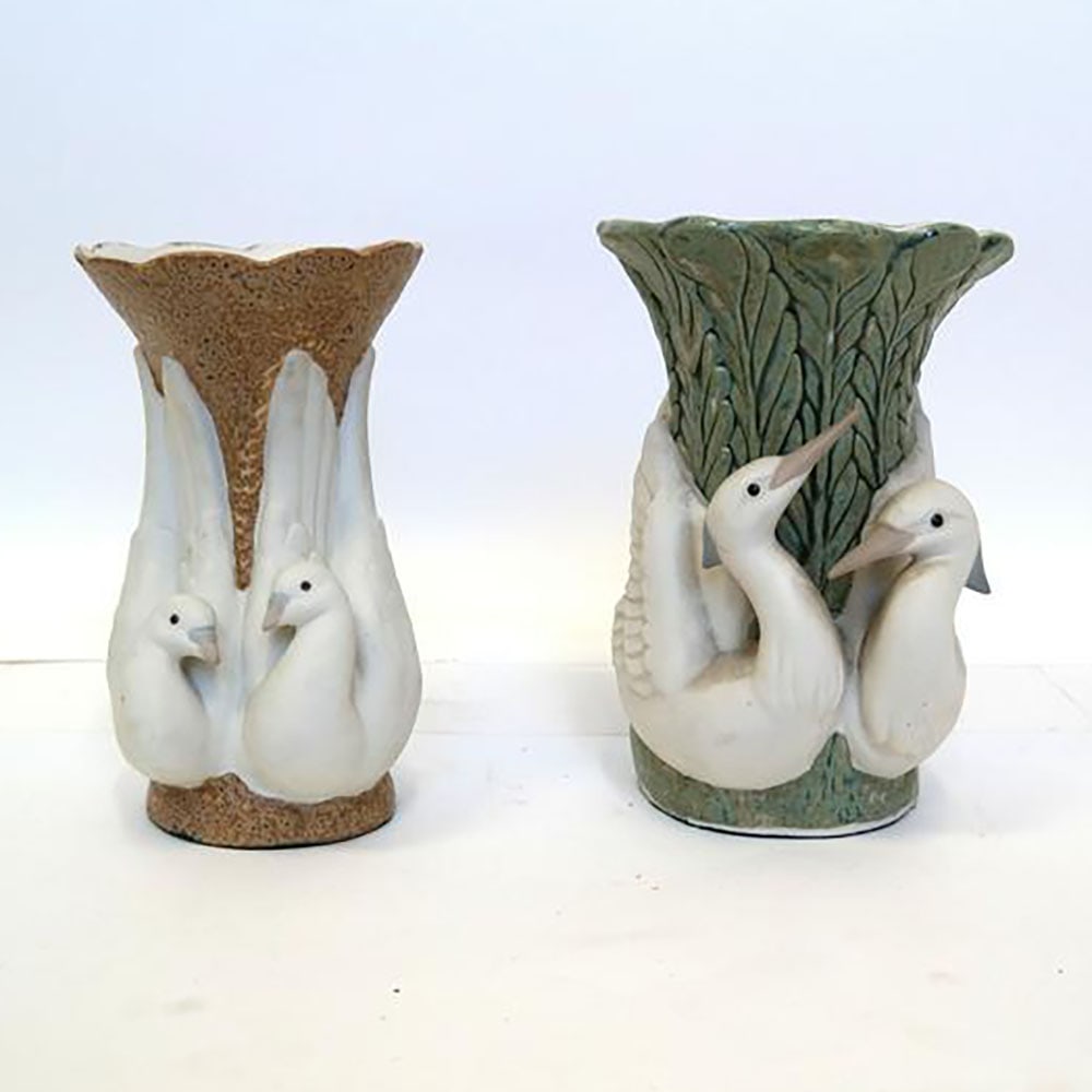 Two P.A.L. Spanish Porcelain Vases: Glazed and unglazed vases, bird adorned. [Larger: 9 1/2" H x 7" Diam.].