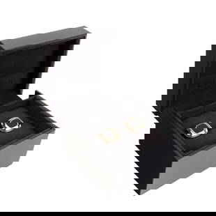 Pair 18K Gold Gucci Cufflinks: From 416 F. with black inset stones. 1.6mm square tops. In Gucci box. 16 grams inclusive.