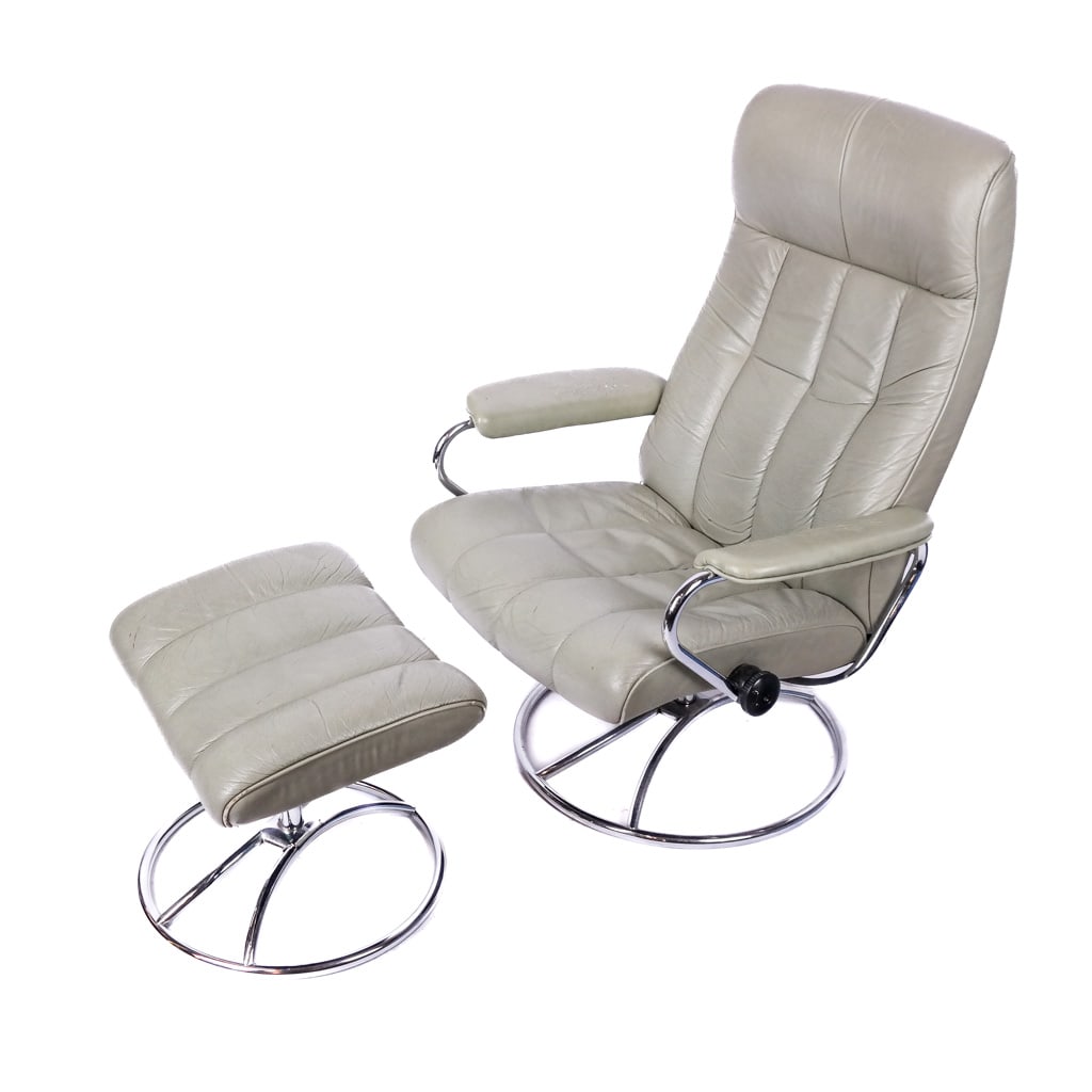 Ekornes, Norwegian Modern Green Chair and Ottoman: 20th century, Norwegian mid-century modern green swivel reclining chair and ottoman. [38 1/4 x 28 1/2 x 29 inches]. Craquelure.