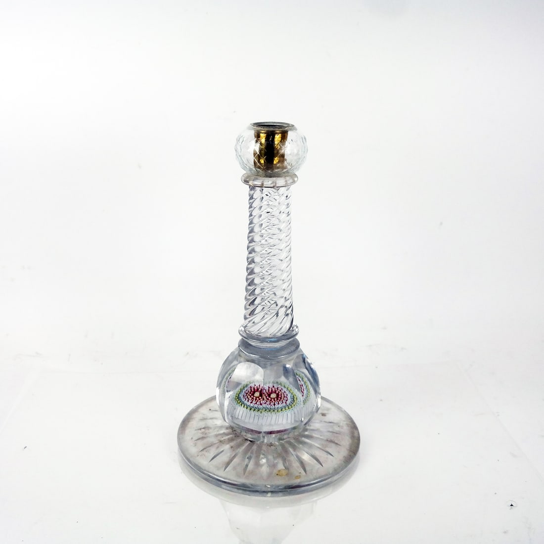 Clear and Millefiori Glass Candlestick: Clear and millefiori glass candlestick, 20th century, having a twist standard with faceted base, in the manner of St. Louis or Whitefriars; unmarked. Provenance: From the estate of a prominent Upper E