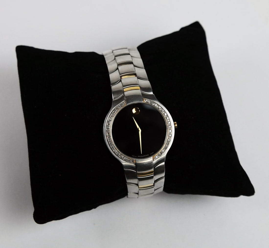 Movado Two-Tone Watch: Movado two-tone watch with diamond bezel.