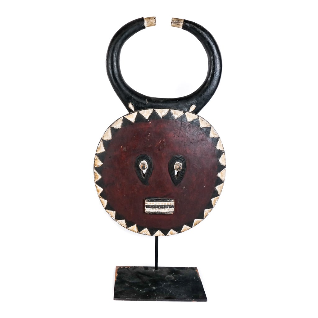 Wooden African Mask on a Stand: Wooden African mask on a stand. [With stand: 21" H].