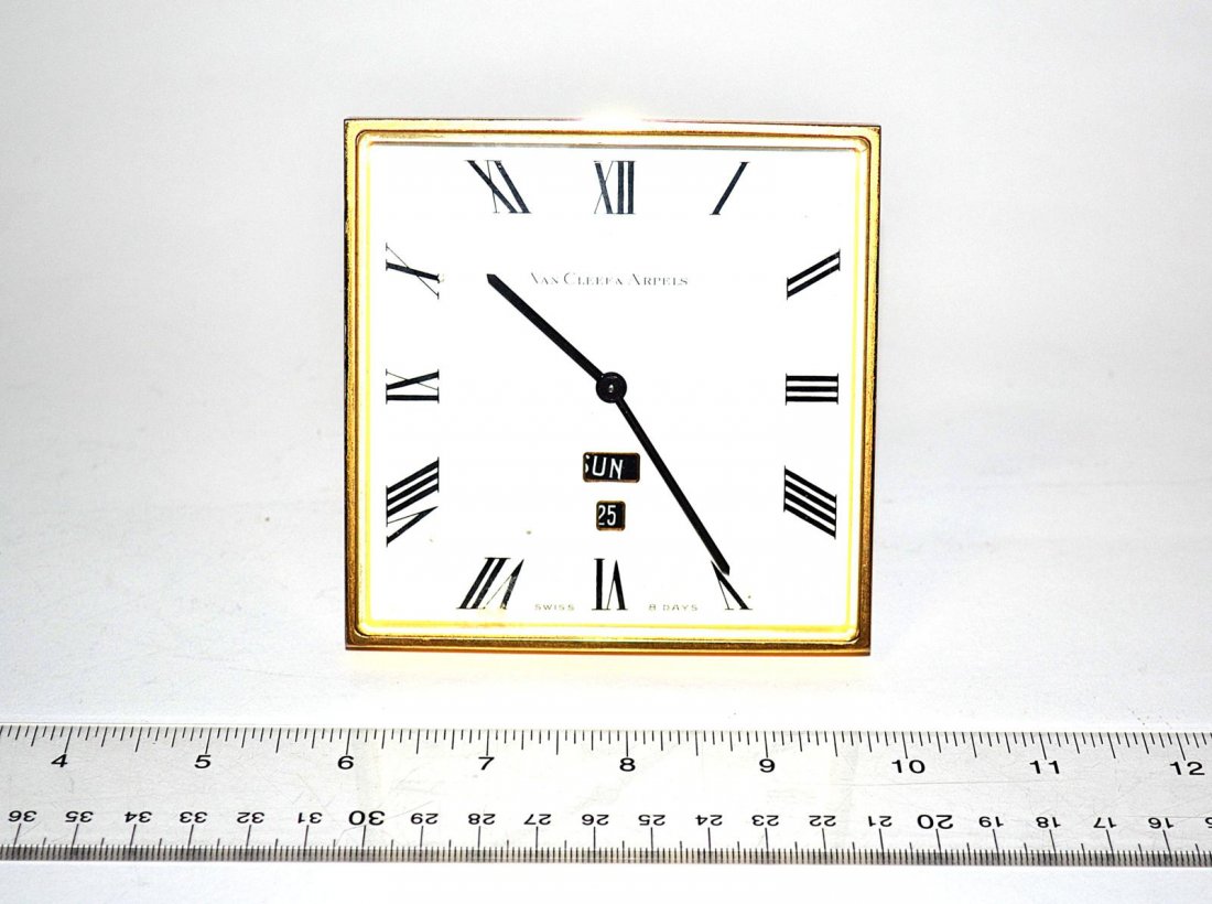 Van Cleef & Arpels Travel Clock: Gold-tone bronze eight day clock with Swiss movement. 4" sq x 2 1/2" deep [open].