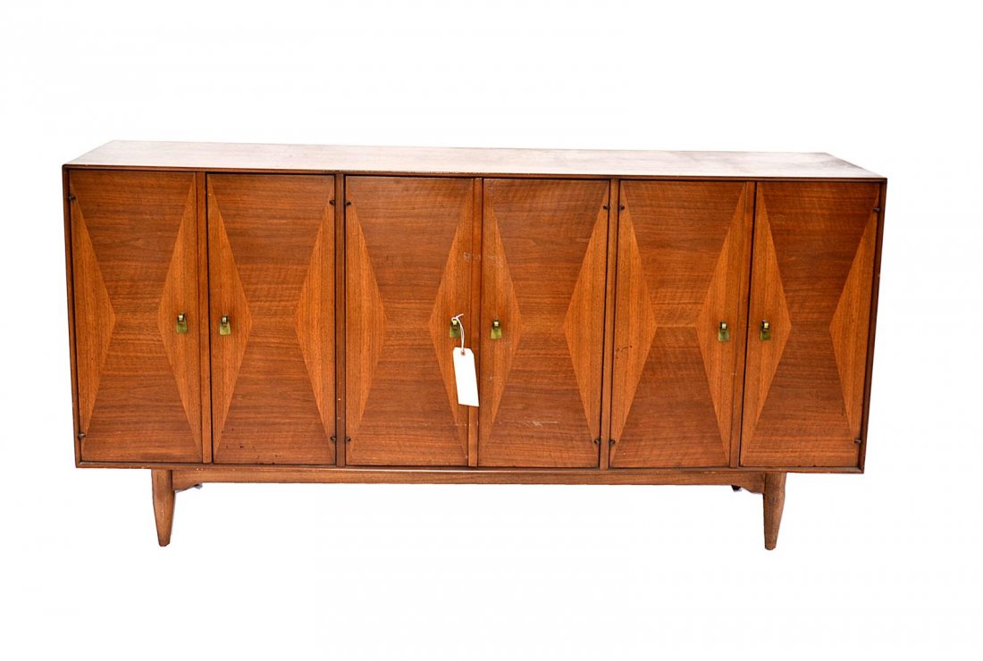 Modern Credenza, Ramsuer: Modern credenza having six doors. The center containing three drawers by Ramsuer Furniture Co., North Carolina. Some wear. 66" L x 19" D x 32.75" H.