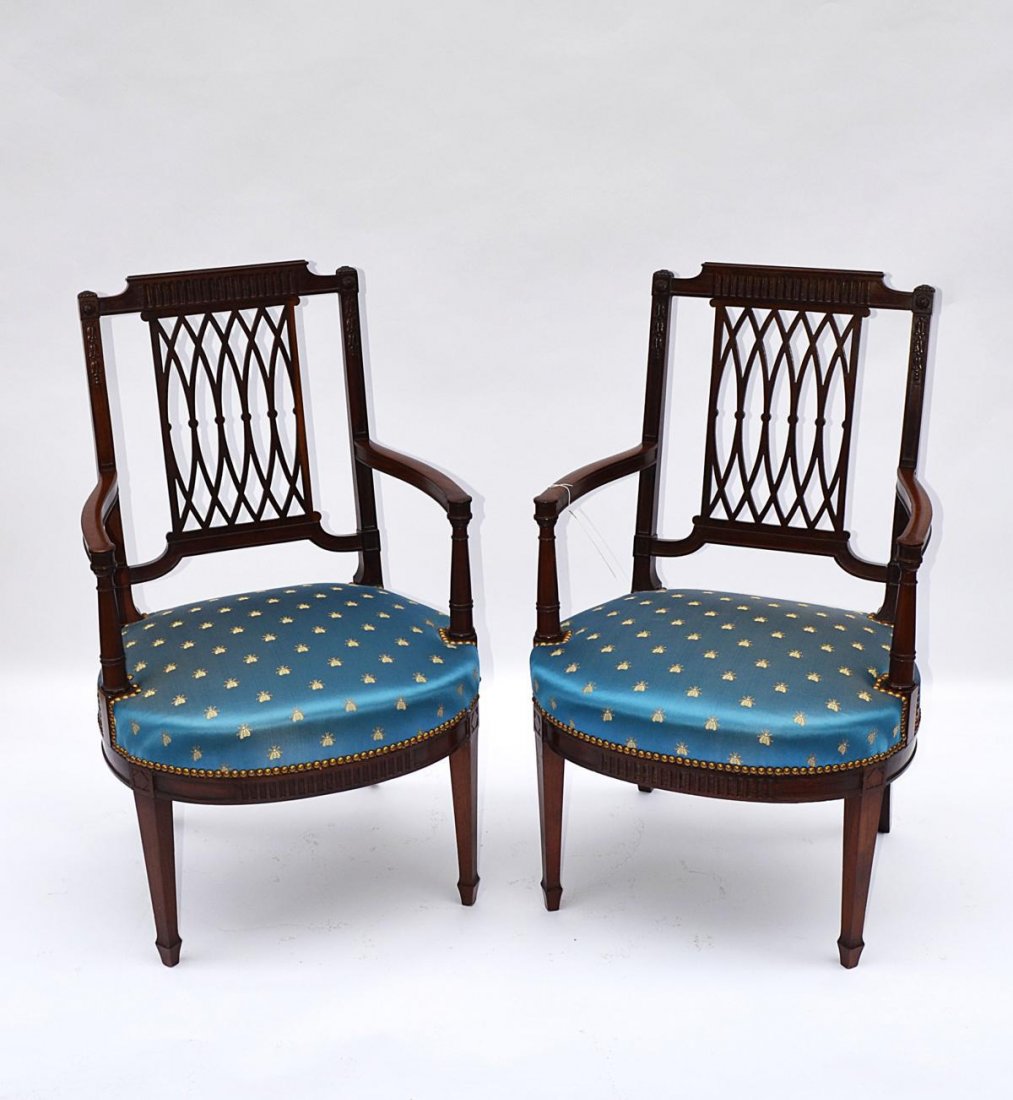Pair of Hepplewhite Mahogany Open Arm Chairs: With bellflower inlay and pierced splat. 35 1/2" H x 16" [H of seat] x 21" W x 20" D.