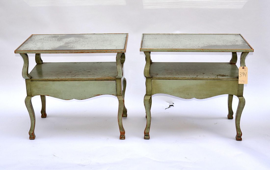 Pair of Jansen Stands: Pair of painted and decorated two tier tables, each having one drawer, mirrored inlet tops, and hoof feet. Wear as with age. 30 1/4" L x 18 1/4" D x 27 1/4" H.