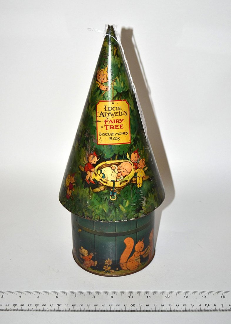 Biscuit Money Box: Tole bank, landscape and baby decor "Lucie Attwell's Fairy tree". 14" "H. Wear.