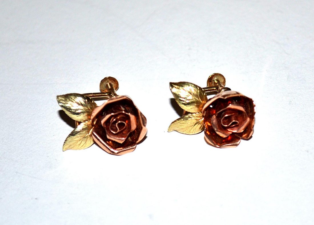 Pair of Pink Gold Earrings: Rose-form screw-back earrings. 4.8 dwts.