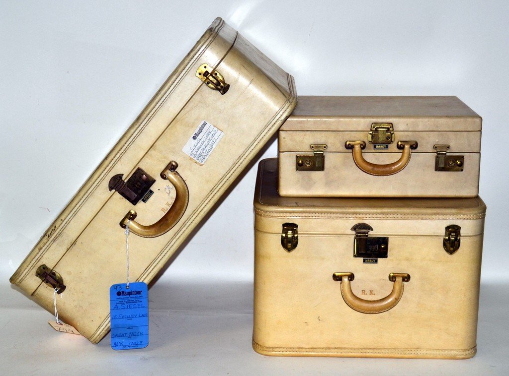 Three Pieces of Hardy Luggage: All beige, graduated sizes, one lock broken and one piece of material lifting.