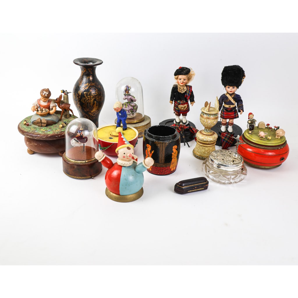 Group of Vintage Figural Music Boxes (9): Group of nine (9) vintage figural music boxes, playing various tunes. [Largest: 6 1/2" H x 6 1/4" Diam.]. Most with separations, losses, residue and wear.
