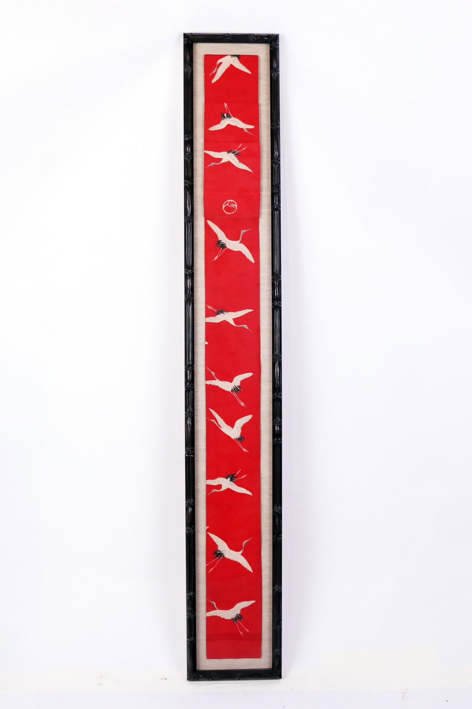 Japanese Framed Crane Textile: Japanese framed crane textile. [61 3/4" x 9"].