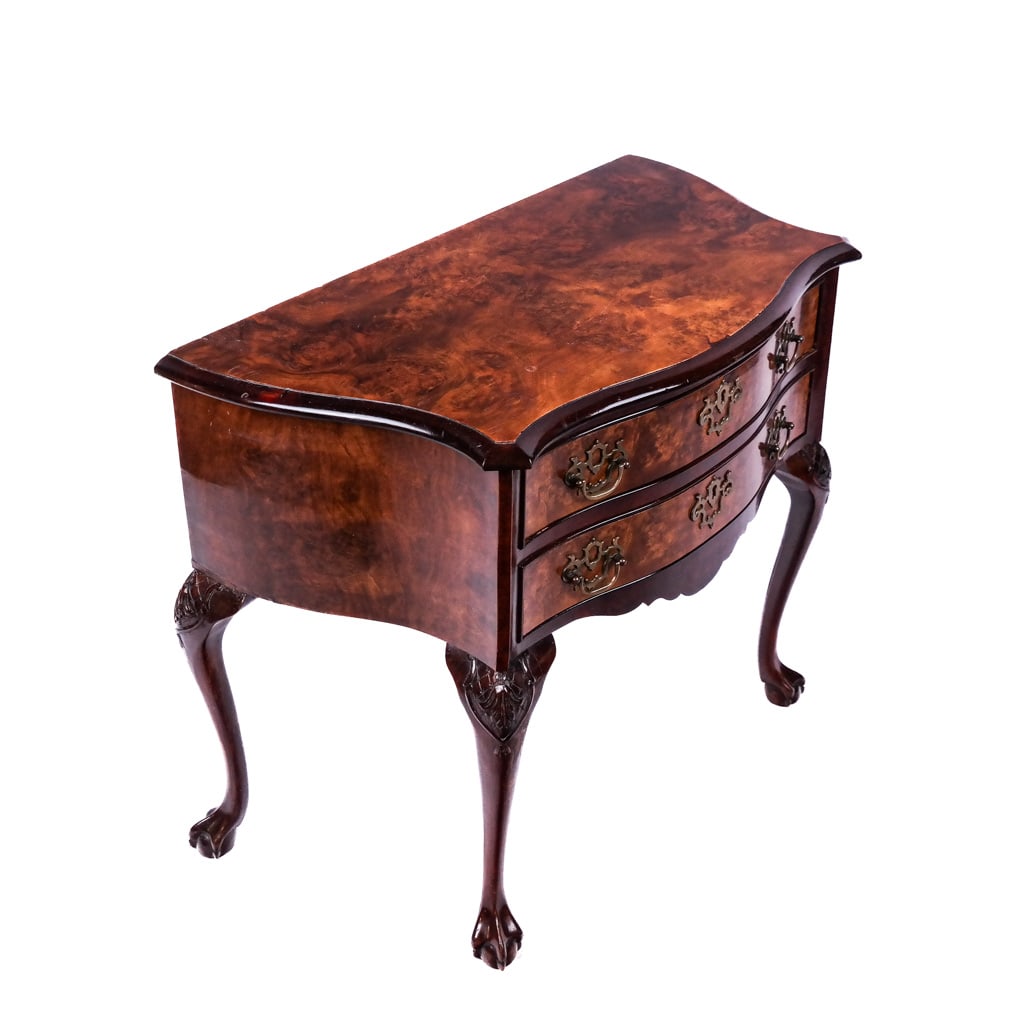 Mahogany Commode: Mahogany commode with burlwood top and serpentine outline over two drawers, raised on carved cabriole legs. [29" H x 36" W x 18" D].