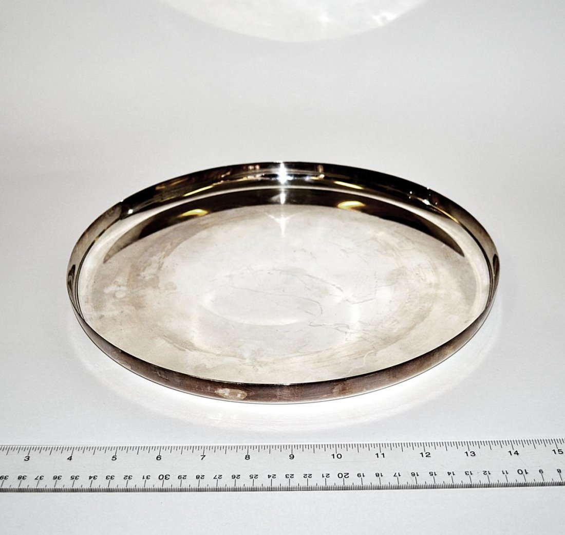 Christofle, France Tray: 20th C. modern round silver-plated tray by Christofle, France. 12 1/4" Dia. Wear.