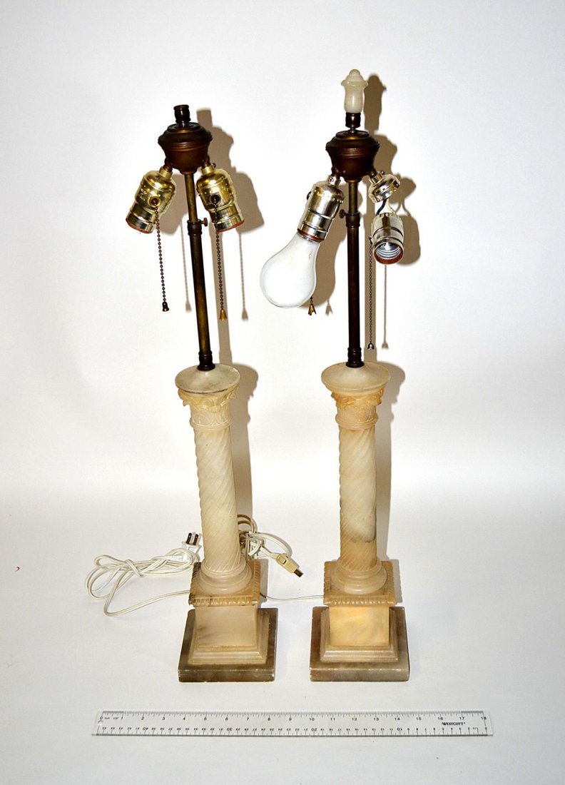 Pair Alabaster Lamps: Pair of Corinthian style alabaster column lamps, overall good condition. Some chips. 28" H.