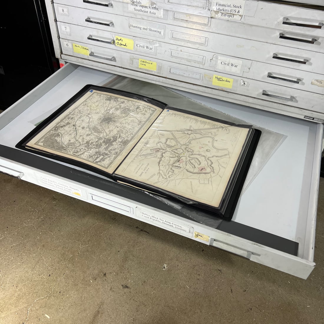 Portfolio of Vintage European Maps: Large artists portfolio with vintage maps of various European countries and cities, including: Germany, Rome, Vienna, Paris, Dresden, and others. Approximately 30 pieces. As is, as shown. Provenance: 