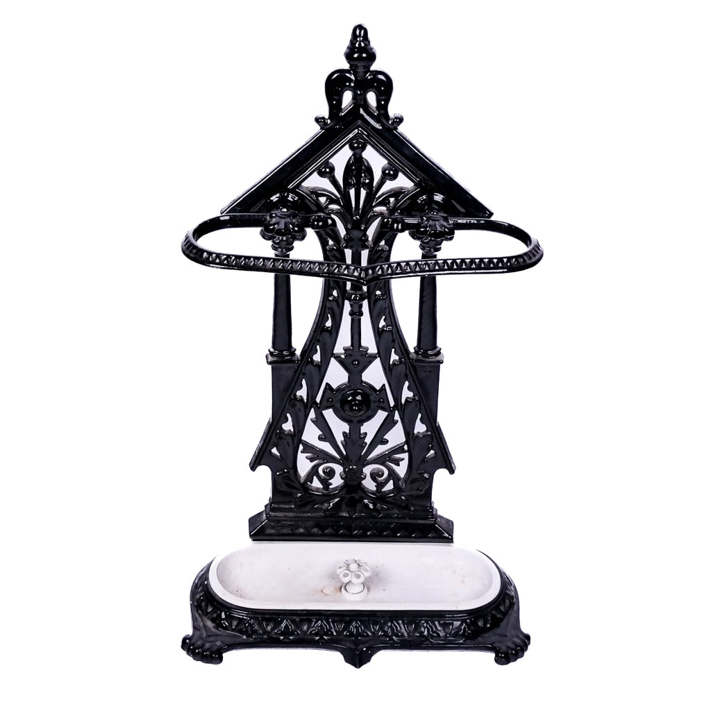 Black-Painted Iron Umbrella Stand: Black-painted iron umbrella stand, with a liner. [32" H x 17 1/2" H x 9" D].