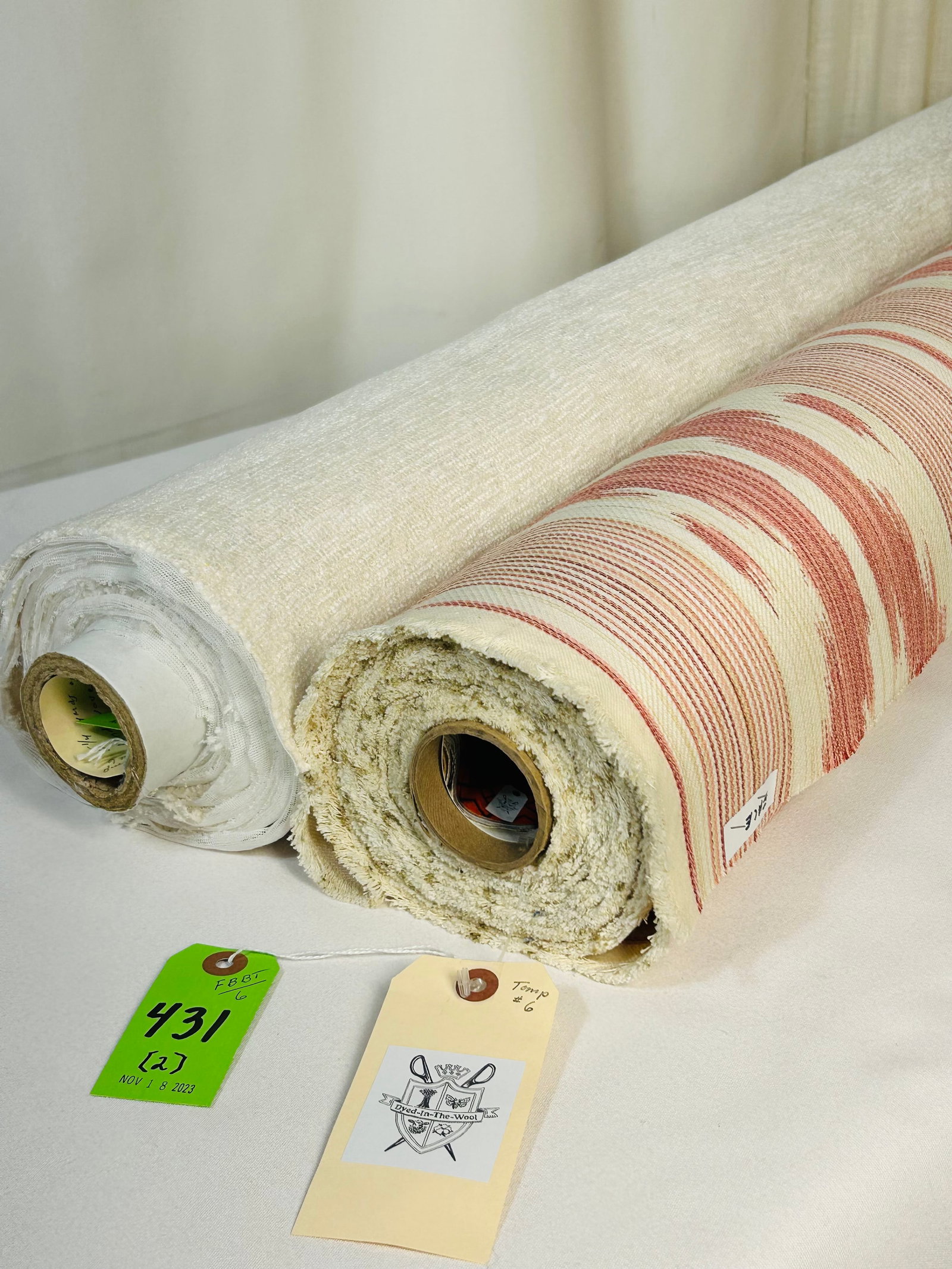Ikat-Style Stripe and R. Crowder Chenille Fabrics: 1) 11 1/2 yards of strie Ikat-style jacquard stripe in cotton and viscose. The pinks, reds, ivory and sand all-purpose textile is 56" wide. The reversible quality has design repeats of 12 1/4" vertica