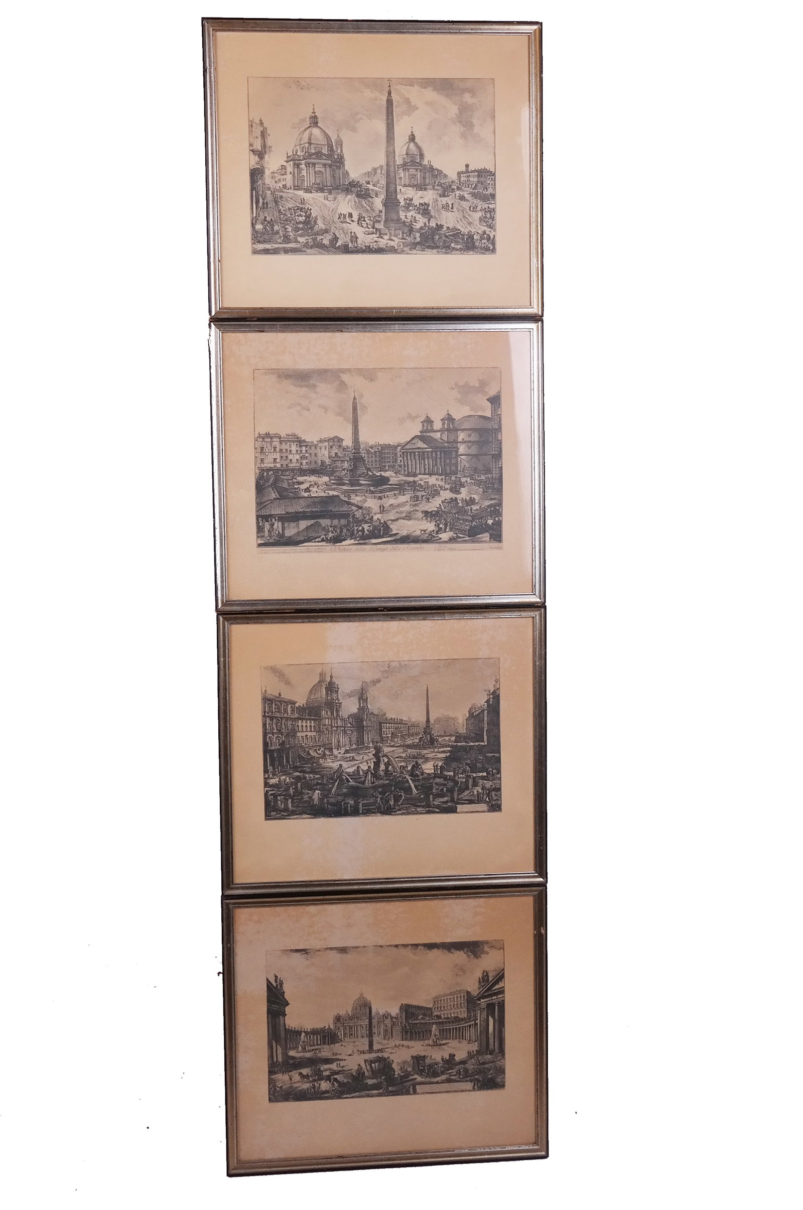 Set of 4 Piranesi Reproduction Prints: Set of four (4) Piranesi reproduction prints depicting Roman scenes, on faux aged paper. [Art: 8" H x 12" W; Frames: 15" H x 17" W].