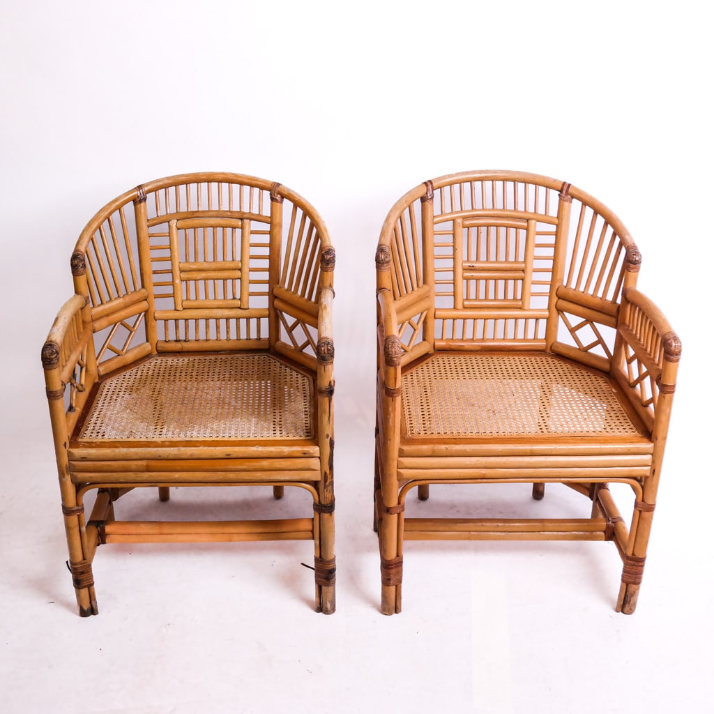 Pair of Brighton Pavilion-Style Bamboo Chairs: Pair of Regency-style bamboo, geometric-design chairs with caned seats. 20th century. [32" H x 21" W x 18 1/2" D; 16" H to seat]. Wear to chairs; cane in good condition.