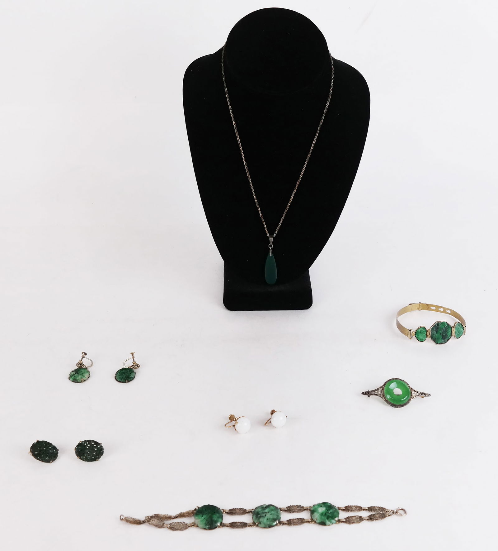 Jade and Faux Jade Mounted Jewelry: Sterling silver and gold-tone mounted jade and faux jade jewelry, including earrings and others.