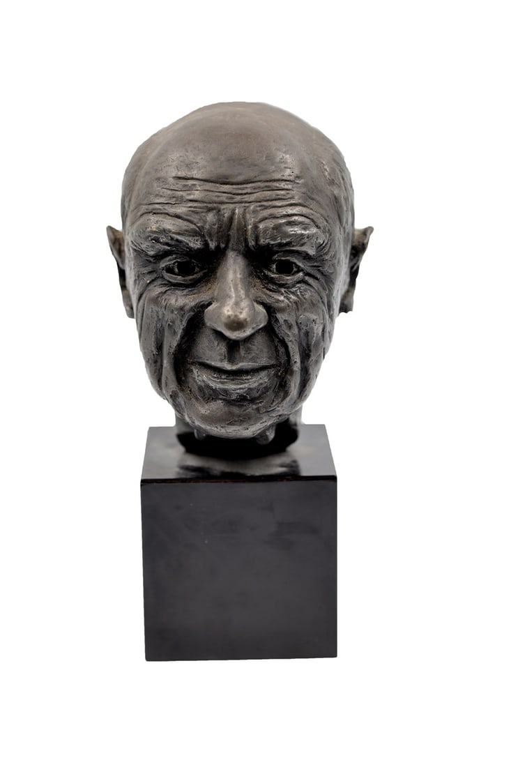 Composition Bust of Picasso: Composition bust of Pablo Picasso, signed "Busse", mounted on a square base. [9" H x 6 1/2" W]. Loss to left earlobe.
