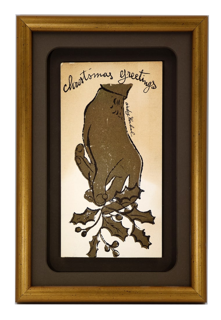 Andy WARHOL: Vintage Greeting Card: Andy Warhol (American, 1928-1987) vintage greeting card depicting a hand holding a holly branch, mounted and framed under glass. [Frame: 11" H x 7 1/2" W]. Corners lightly worn.