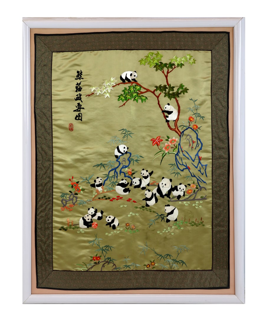 Vintage Chinese Embroidered Silk Panel: Vintage Chinese embroidered silk panel depicting pandas at play; matted and contained under glass in a white laminate frame. [Image: 28 1/4" H x 21" W; Frame: 38 1/2" H x 29" W]. In good condition, wi