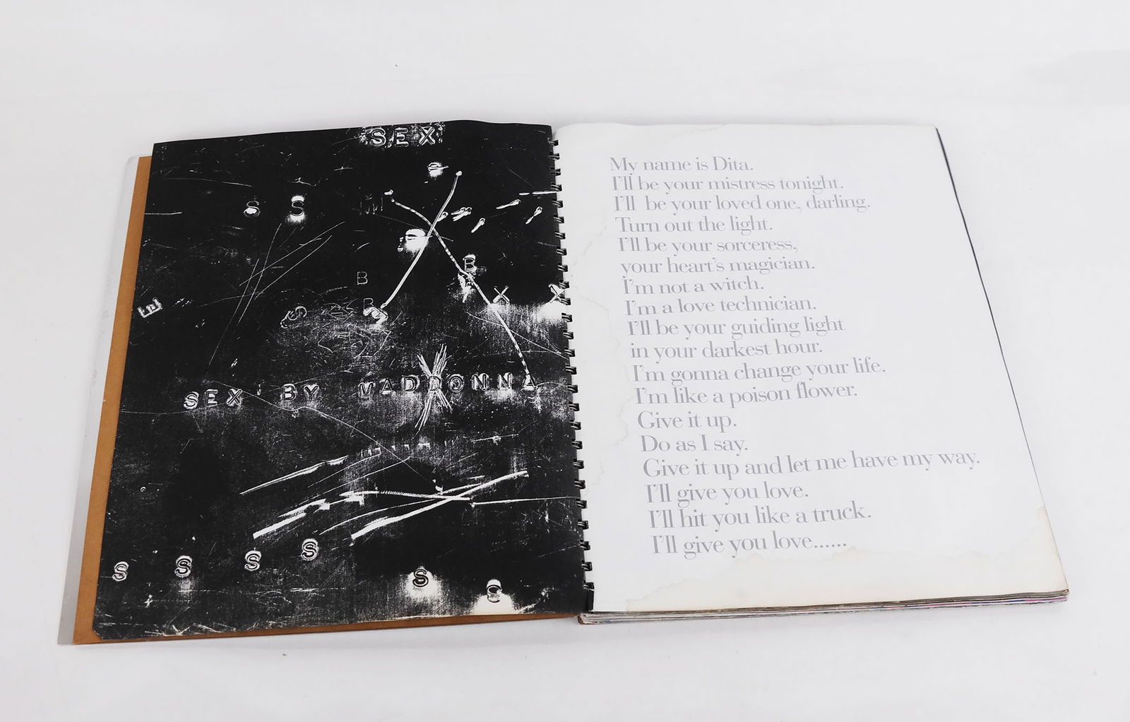 Madonna "Sex Book", First Edition 1992: Madonna "Sex Book", First Edition, 1992, with Steven Meisel photographer of the provocative views of erotic and sexual fantasies. [13 3/4" H x 11 1/4" W]. Lacking CD and inserts. Damaged pages and cov