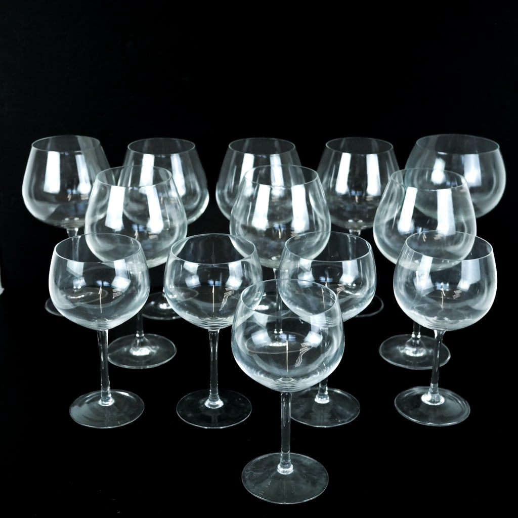 13 Crystal Wine Glasses: Thirteen (13) crystal wine glasses. [7" H (x5); 8 1/4" H (x8)].