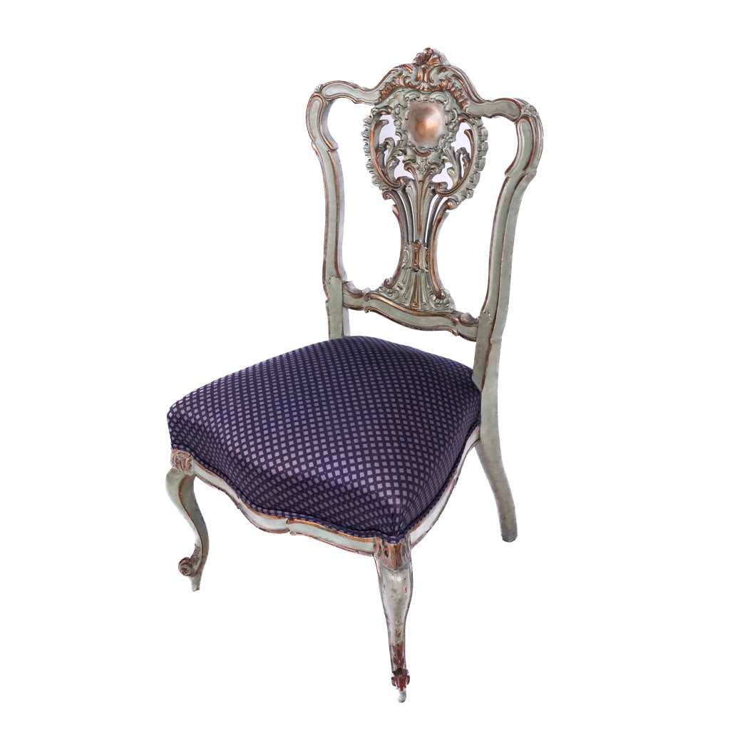Venetian-Style Painted Carved Side Chair: Antique green-painted ornately carved side chair with gilt trim. Match with Lot 568. [39" H x 19" W x 17" D; 16" H to seat].