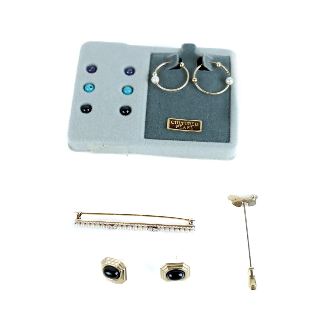 Group of 14K Gold Jewelry: Group of 14K gold jewelry, including butterfly pin, bar pin with pearls, pair of earrings and an earring set.