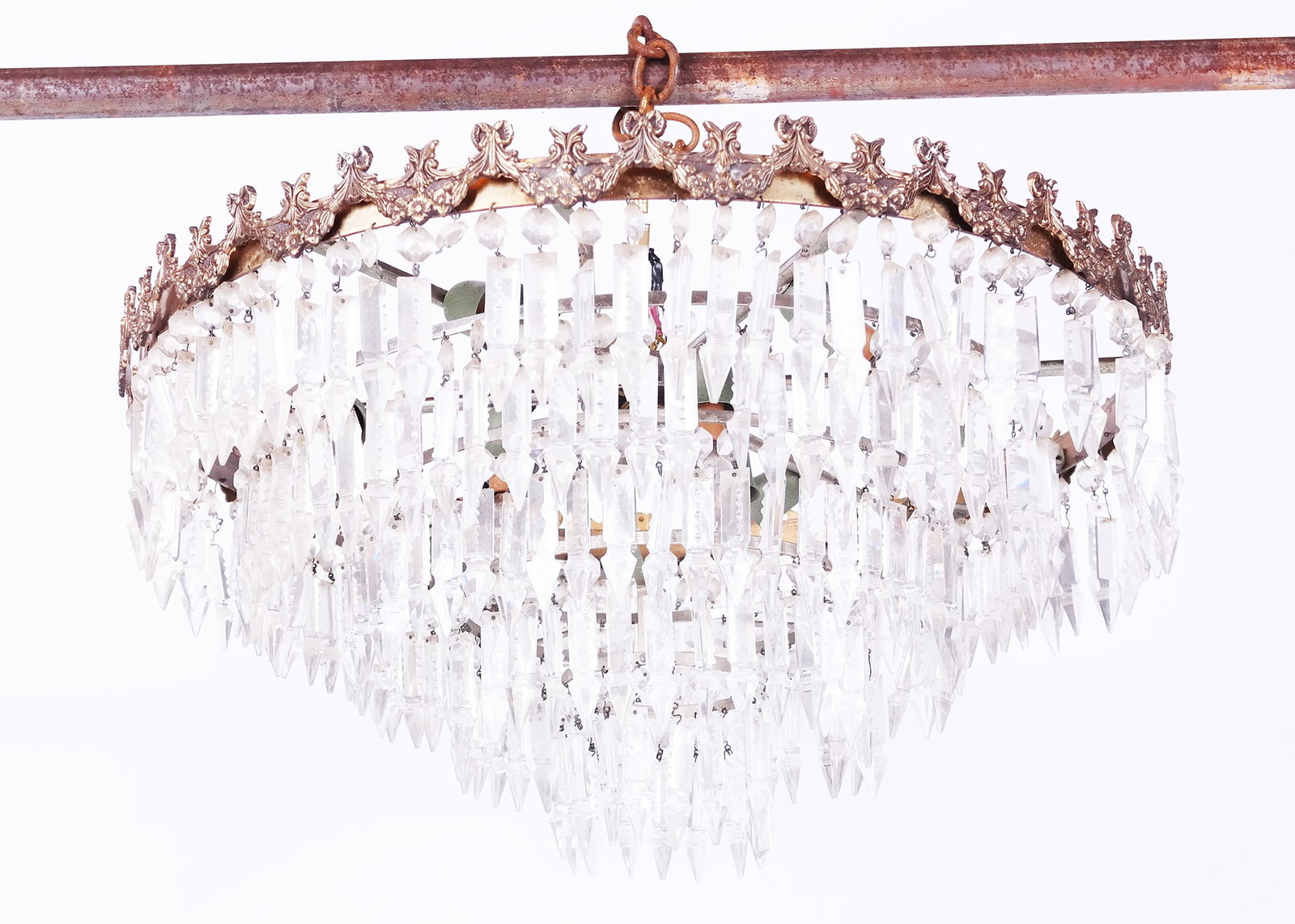 Gilt Metal & Glass 6-Light Tiered Chandelier: Gilt metal and glass six-light tiered chandelier, having faceted pendant prisms. [8 1/2" H x 26" Diam.]. Lacking and losses to prisms, light oxidation to metal.
