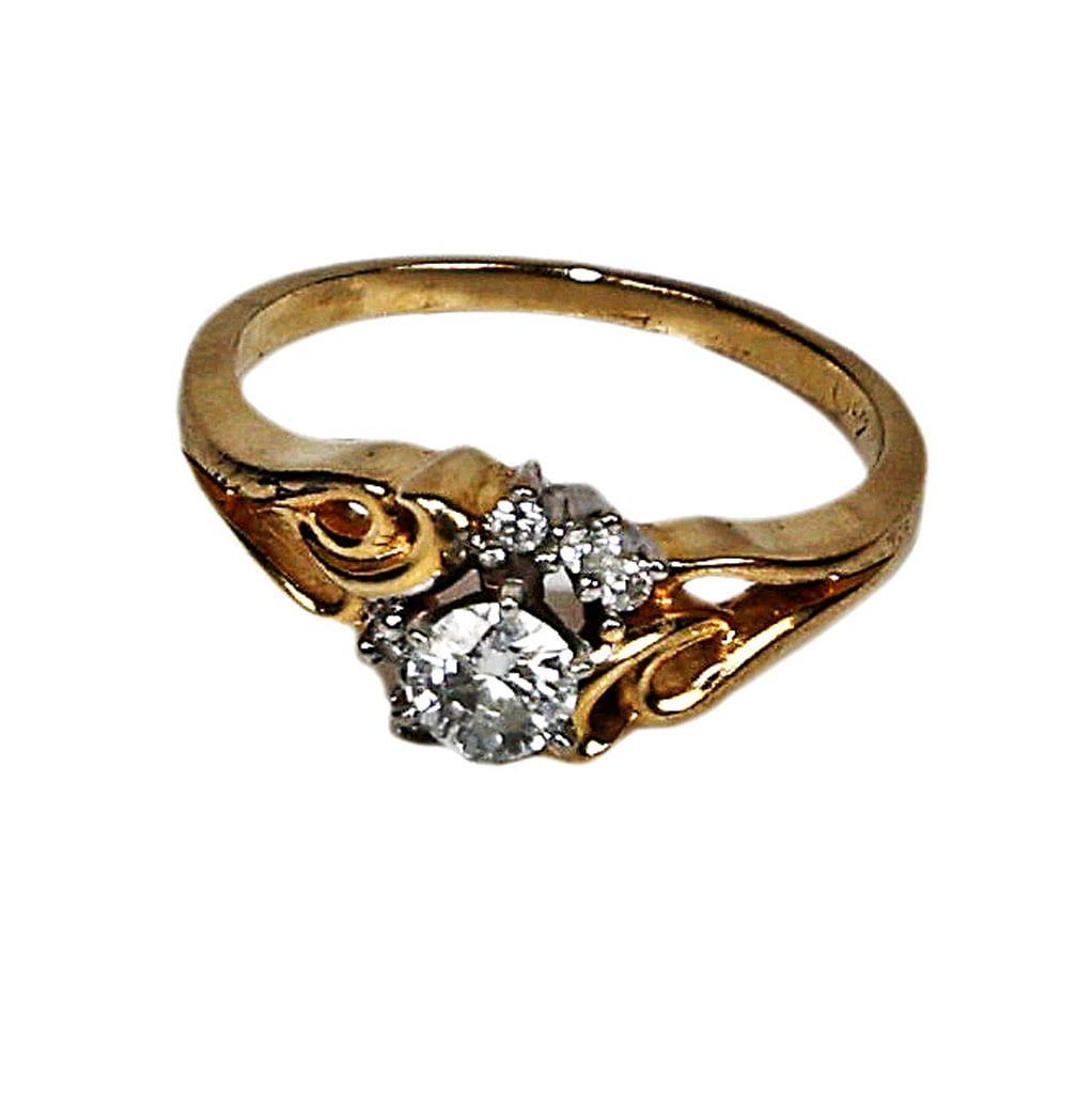 Diamond & 14K Gold Wedding Ring: Wedding ring having a 4mm center diamond flanked by 6 small diamonds in a 14K yellow gold setting. Size 6 1/4.