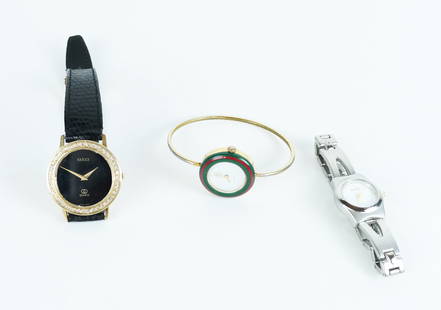 Three Gucci Wristwatches: Three Gucci wristwatches in brushed steel, having classic red and green bezel in gold tone with faux diamond.