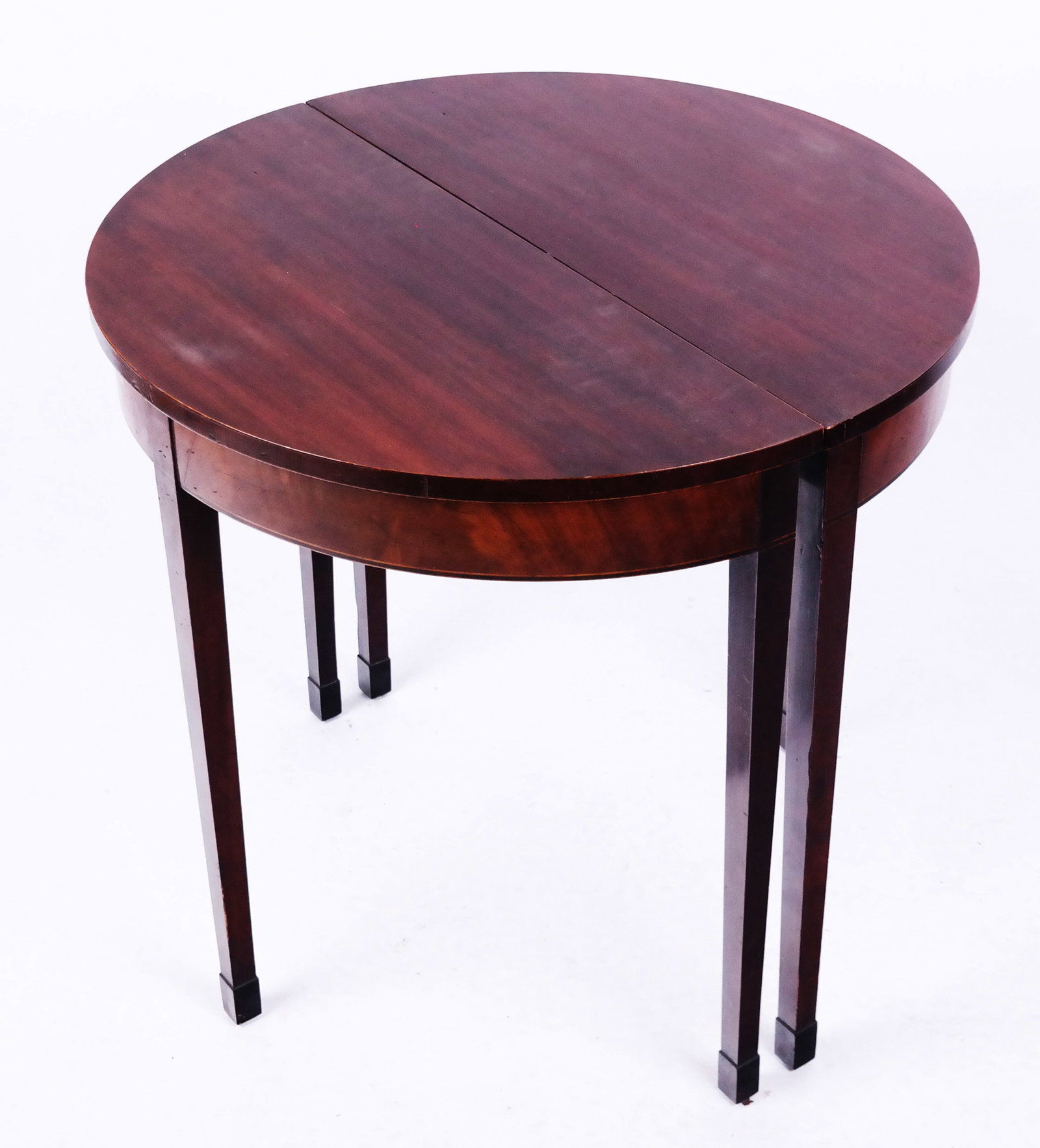 Pair of American Mahogany Demilune Consoles: Pair of American mahogany demilune consoles. [28 1/2" H x 29" W x 14" D].