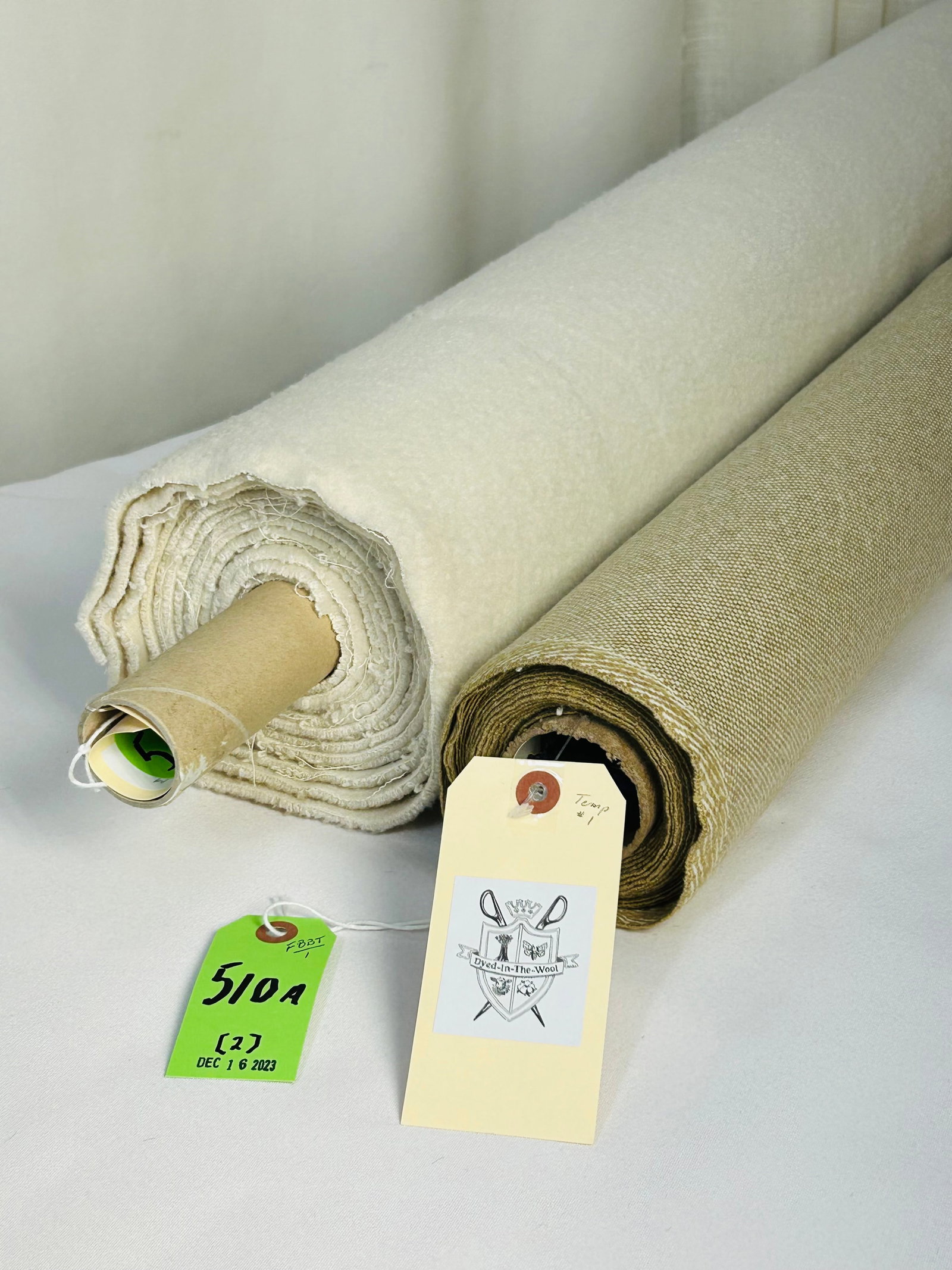 Holland & Sherry Wool & Boiled Wool Fabrics: 1) 5 3/4 yards of Holland & Sherry's "Modern Gent" # DE 13148, color "Dandy II Go", 58" width. The tan and ivory classic worsted wool upholstery plain has a buttery hand. 2) 4 1/4 yards of a boiled wo