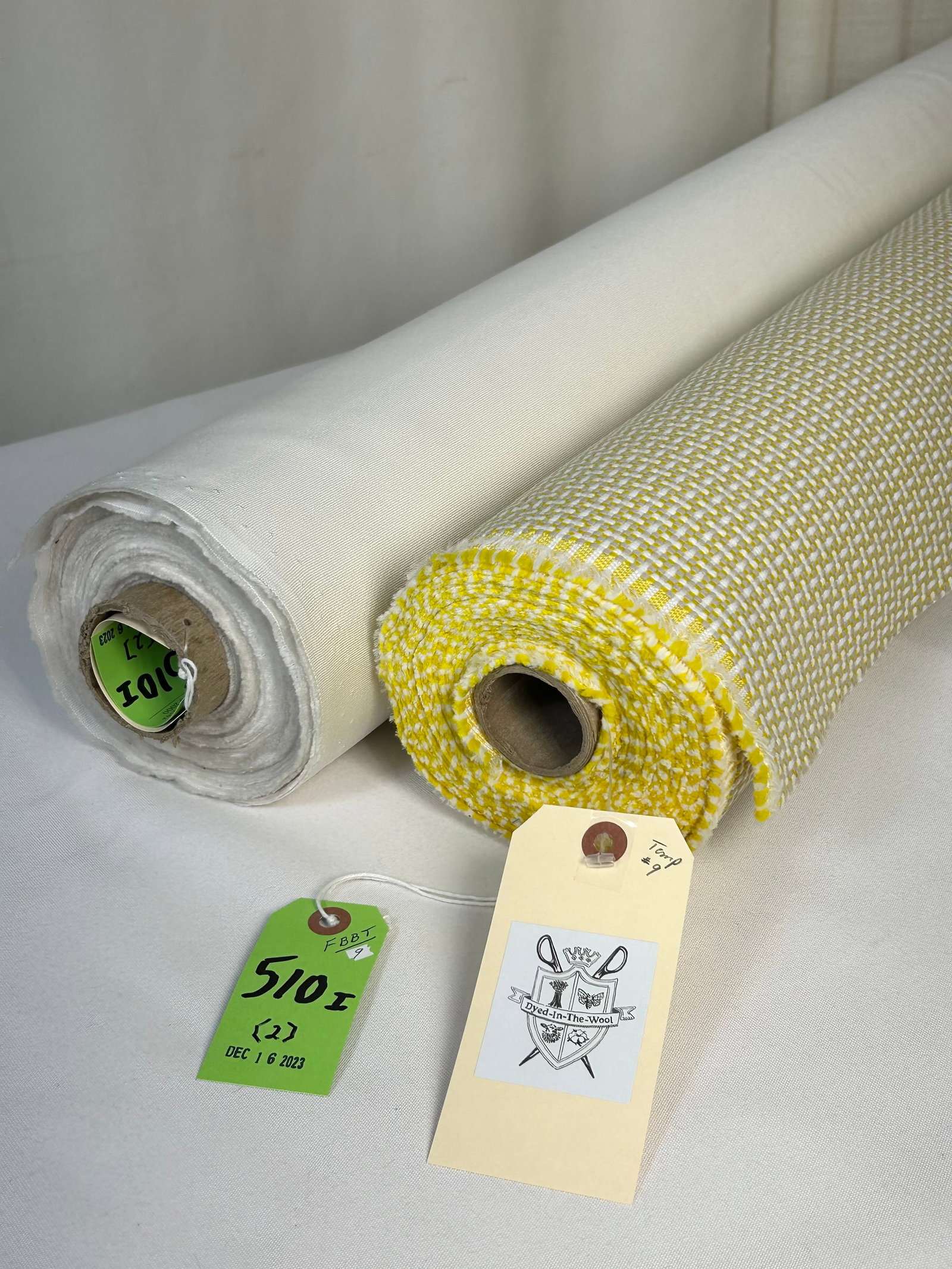 Dedar's Performance Plain and Texture Fabrics: 1) 7 1/4 yards of Faubourg Italian for Dedar solution-dyed polypropylene in lemon, tan and white, for indoor/outdoor upholstery, 56" wide. The mini-grid will cheer up any space! 2) 22 1/2 yards of Ded