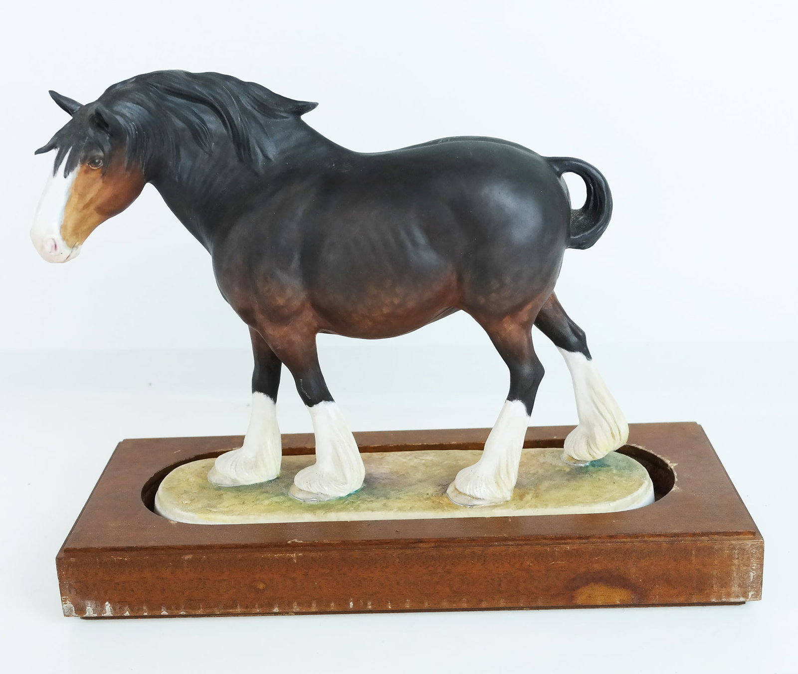 Malvern English Porcelain Equestrian Sculpture: Malvern English porcelain equestrian sculpture, "Shire Mare", modeled as the British draft (draught) horse native to England, from a limited edition, numbered 29/250, signed to base, with wood stand. 