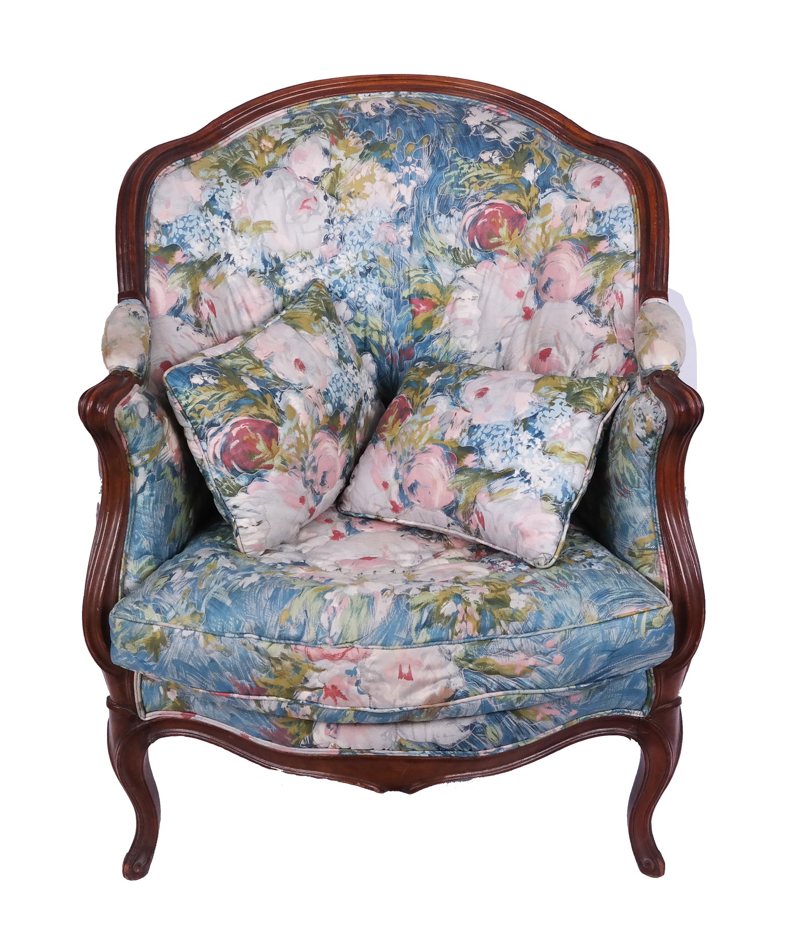 French Provincial Bergere: French Provincial bergere, having a carved frame with floral upholstery, down cushion and two pillows. [35" H x 28" W x 30" D].