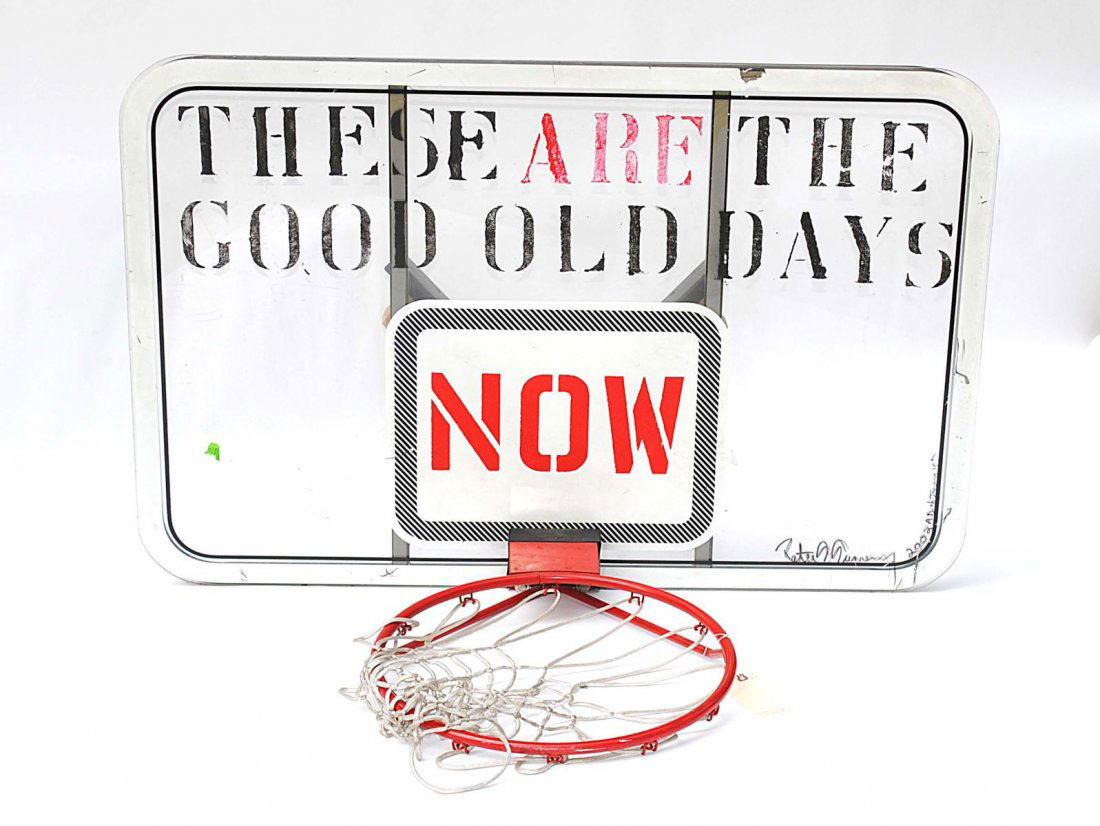 Peter Tunney Basketball Hoop Sculpture: Hoop and clear acrylic backboard stenciled "These are the Good Old Days/ Now" and signed at bottom right "Peter Tunney/2002 A.D. a/o January 15th." 47 1/2" W x 27 1/2" D. Scuffs and scratches.