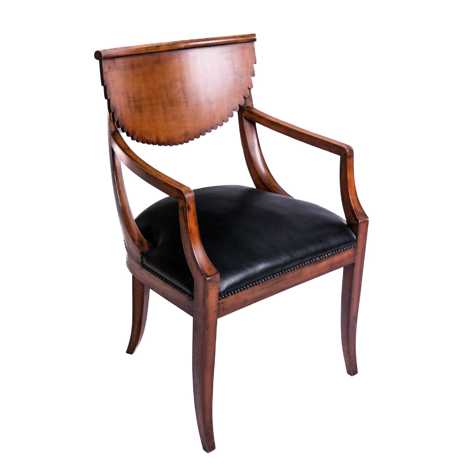 Italian Carved Armchair: Italian carved armchair, late 20th century, having a scalloped back rest and black seat with nailhead trim, bearing label to underside. [33 1/2" H x 21" W x 19 1/2" D].