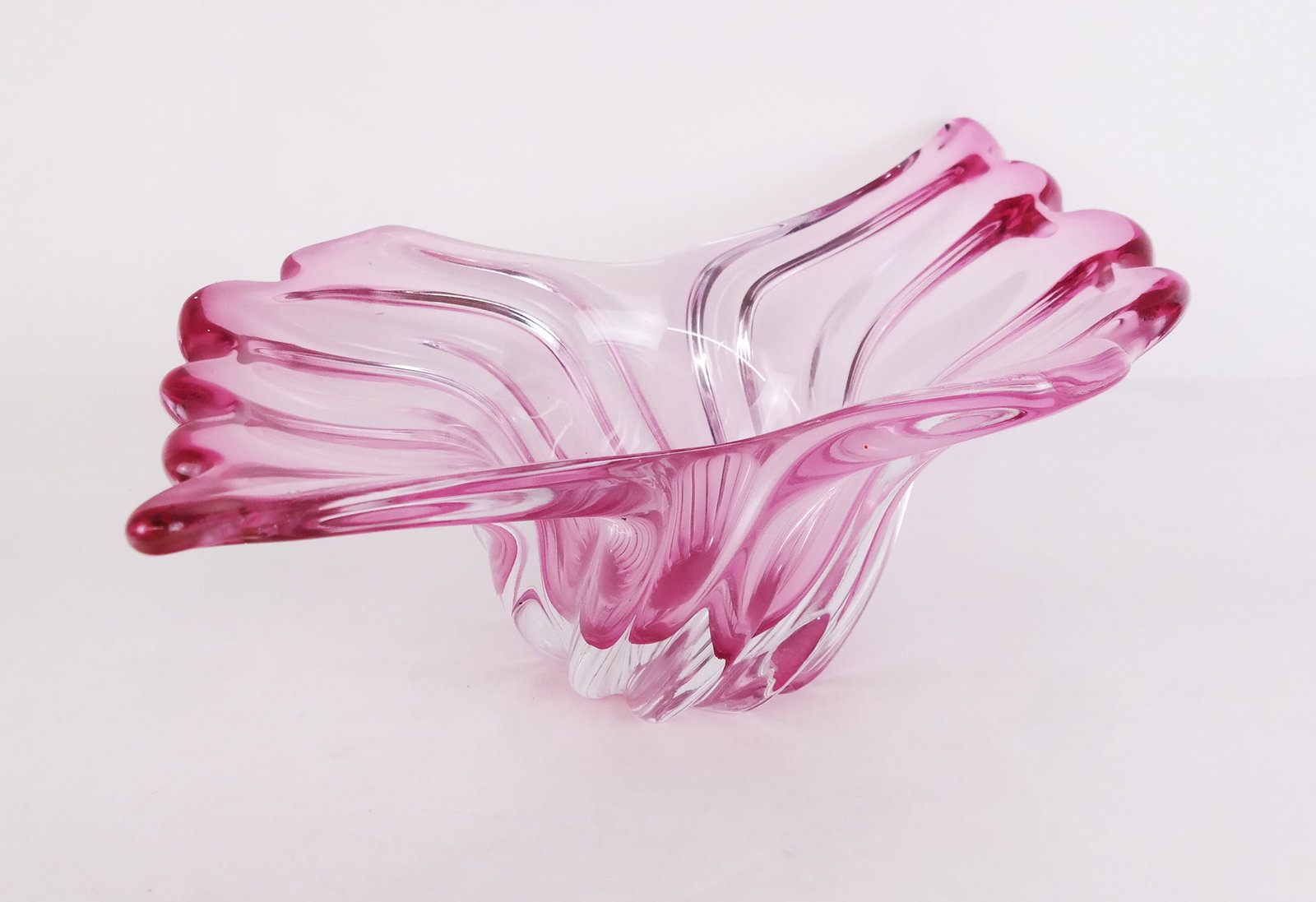 Murano Art Glass Centerpiece Bowl: Murano art glass centerpiece bowl, mid-20th century, in pink-to-clear, glass of amorphic fan outline, in the manner of Barover or Venini, unsigned. [6" H x 18 1/2" W x 9 3/4" D].