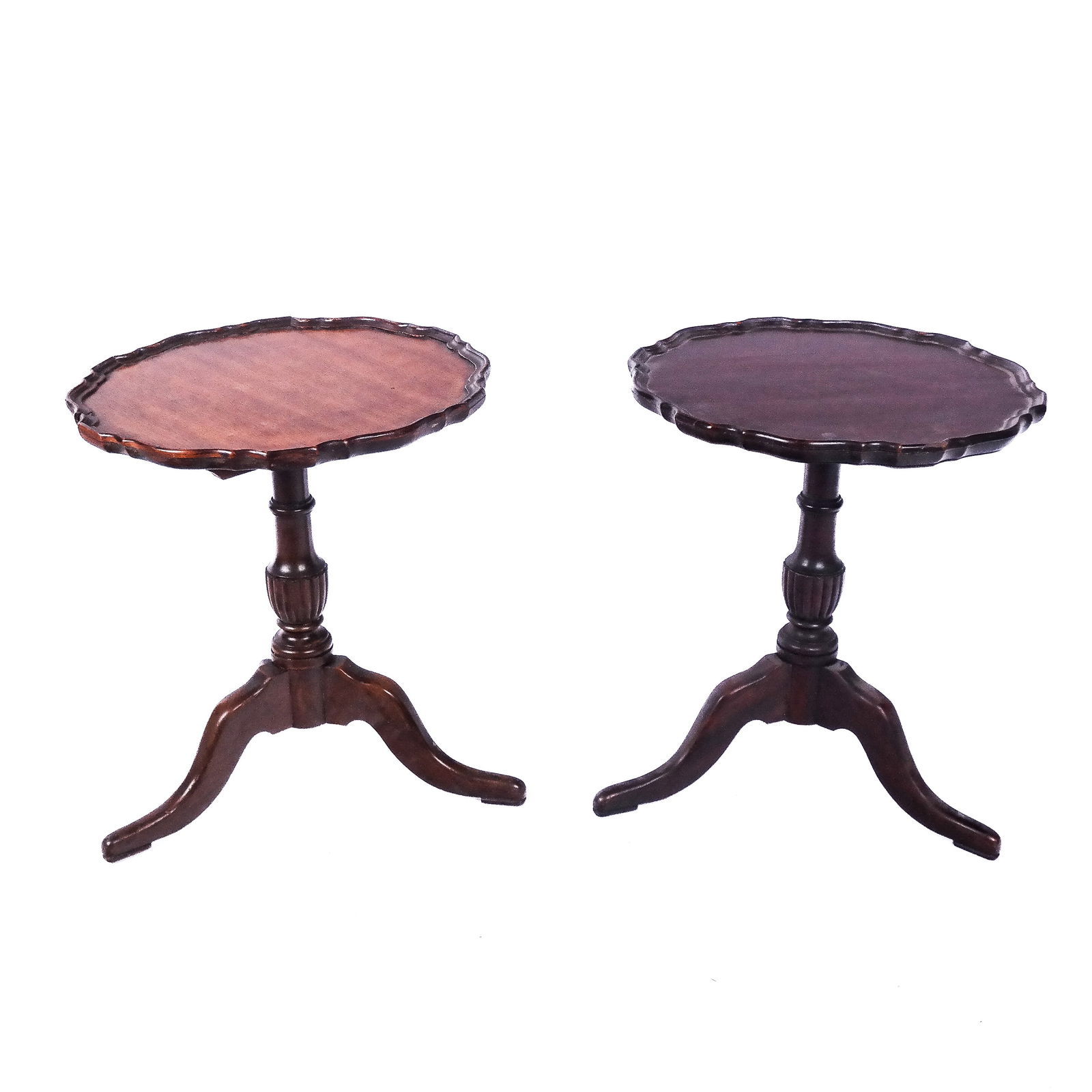 Pair of American Petite Piecrust Tea Tables: Pair of early 20th century American mahogany scallop-form tripod tea tables, in different finishes. [20 1/4" H x 18 1/4" Diam. (tops and bases)].