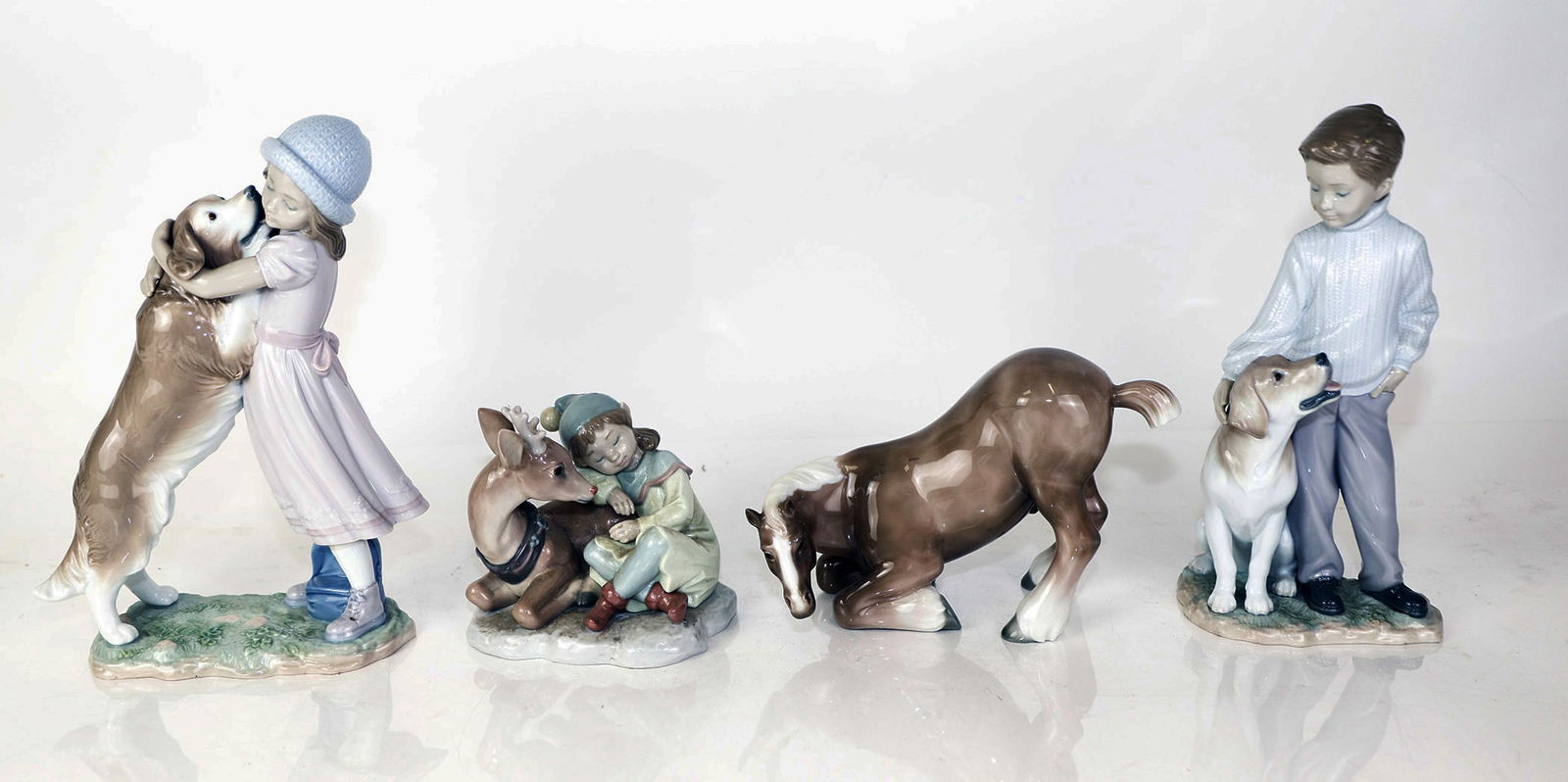 Four Porcelain Lladro Sculptures (1 of 16)